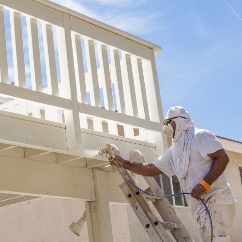 Exterior painting on a deck connected to a house